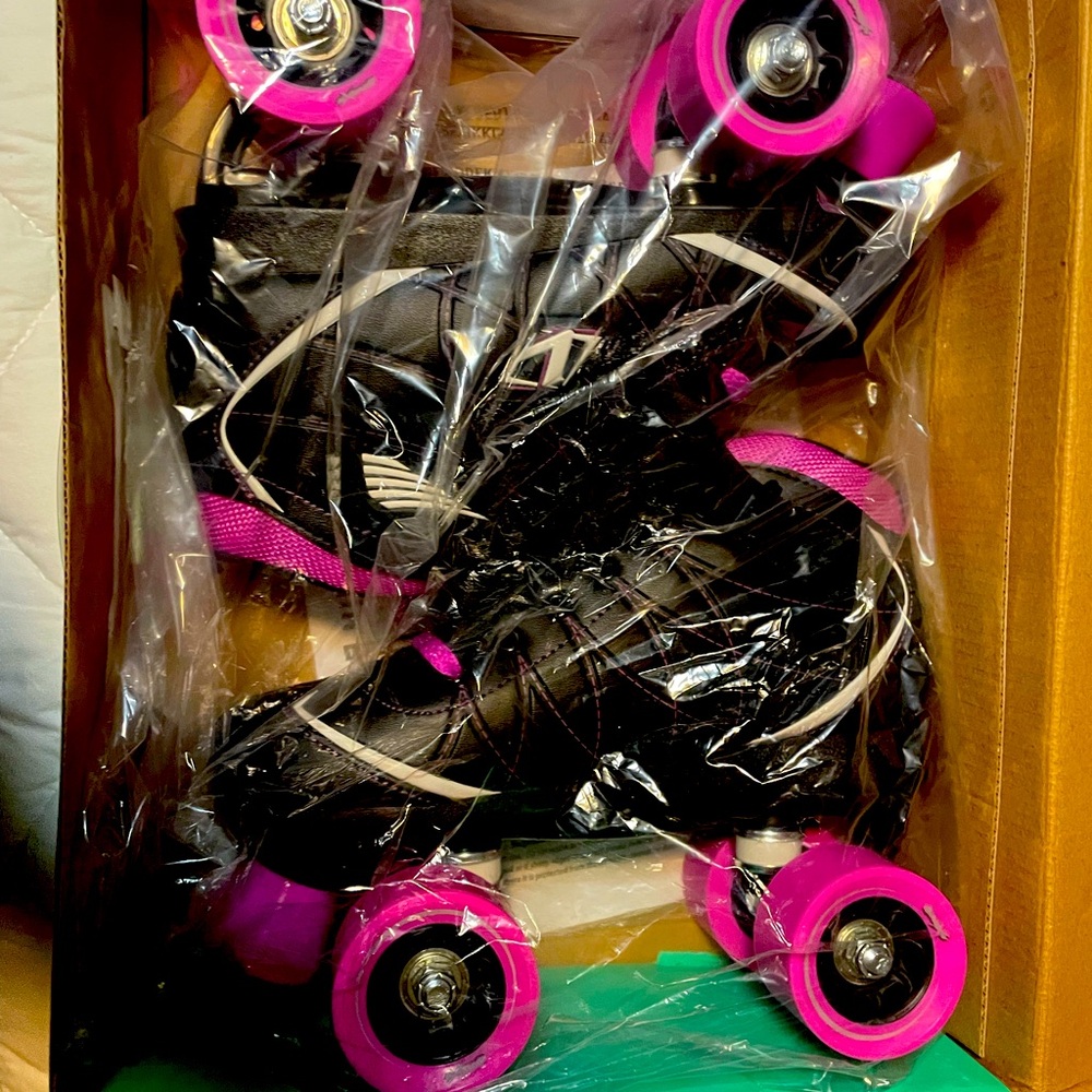 Black and Pink Roller Skates